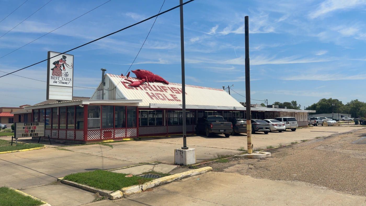 The Crawfish Hole restaurant and sign on South Drive in Natchitoches, Louisiana